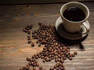 Black coffee with coffee beans
