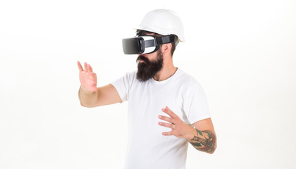 3d technology, virtual reality, entertainment, cyberspace and people concept - happy young man with virtual reality headset or 3d glasses. Bearded man wearing virtual reality goggles in studio.