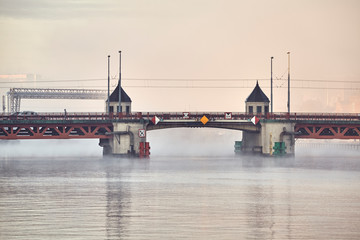 Fototapeta premium Long Bridge in Szczecin City at a foggy sunrise, Poland.