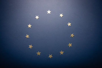 Europe Union symbol - golden stars on blue background. BREXIT crisis.