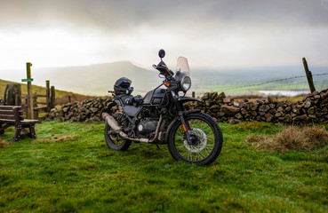 Fototapeta na wymiar Black Dual Sport Motorbike Off-Road in the Countryside