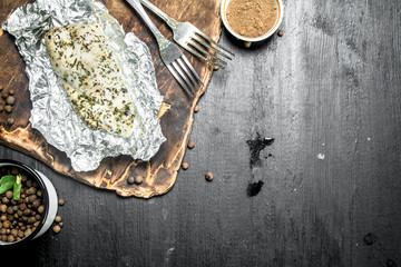 Baked chicken fillet with spices.