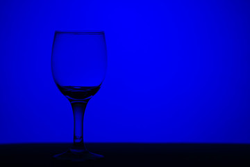 wine glass blue monochrome background