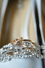 Wedding rings, bride's shoes