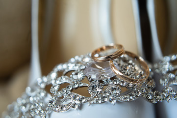 Wedding rings, bride's shoes
