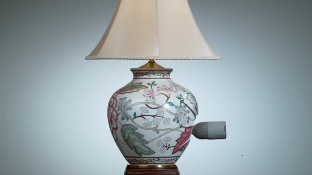 Ceramic lamp shattering in super slow motion