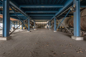 cargo trains stopped in abandoned factory