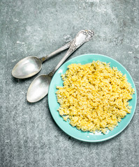 Millet porridge with butter.