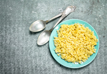 Millet porridge with butter.