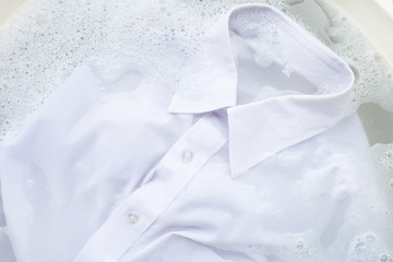 Soak  cloth before washing, white shirt