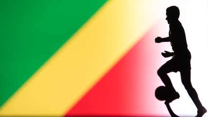 Fototapeta na wymiar The Republic of the Congo National Flag. Football, Soccer player Silhouette