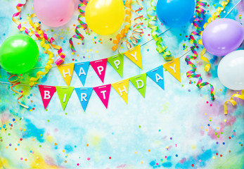 Birthday party frame with balloons, streamers and confetti on colorful background with copy space