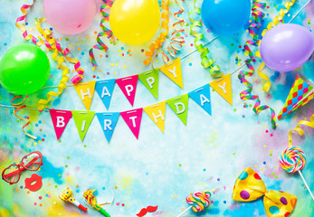 Birthday party frame with balloons, streamers and confetti on colorful background with copy space