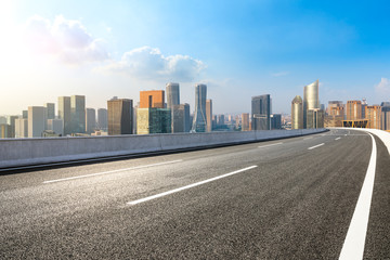 Empty asphalt road and city skyline in hangzhou,high angle view
