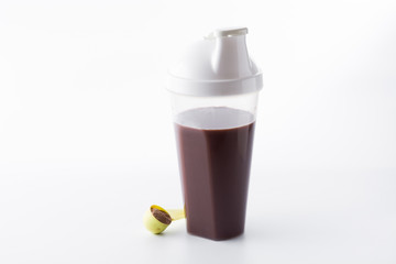 Chocolate protein shake on white background