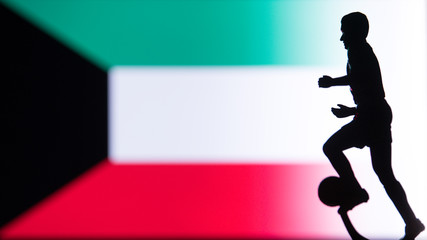 Fototapeta na wymiar Kuwait National Flag. Football, Soccer player Silhouette
