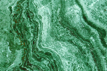 Fototapety  the texture of artificial marble green emerald color with a beautiful pattern similar to the mineral malachite.