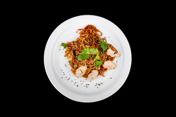 noodles with meat on a black background