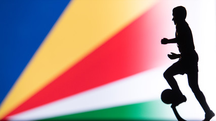 Fototapeta na wymiar Seychelles National Flag. Football, Soccer player Silhouette