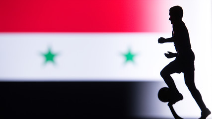 Fototapeta na wymiar Syria National Flag. Football, Soccer player Silhouette
