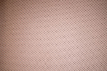 Textured background surface of textile upholstery furniture close-up. burlap beige color fabric structure