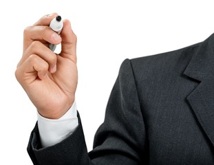 Fototapeta premium Closeup of a Businessman Writing on the Air