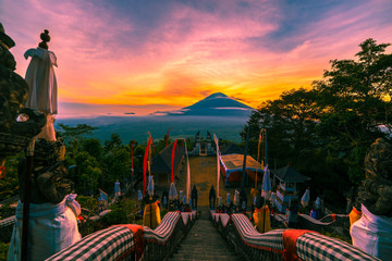 Temple Of Lempuyang Luhur with view to the Agung volcano at the dramatic sunset, Bali, Indonesia