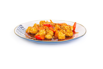 Korean pork in sweet and sour sauce on a white background