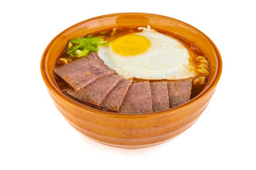 Korean soup with beef tongue on a white background