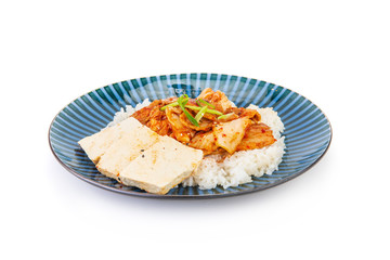 Korean dish with kimchi and tofu on a white background