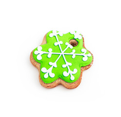 Homemade green gingerbread Christmas cookie, isolated on white. Holiday decoration, winter time food.