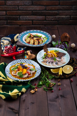 different dishes on a wooden background in Oriental style