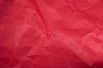Rotes Papier als Hintergrund mit Falten