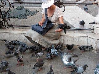 Woman with pigeons