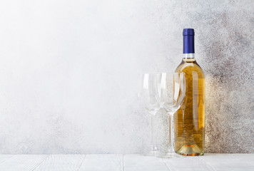 White wine bottle and glasses