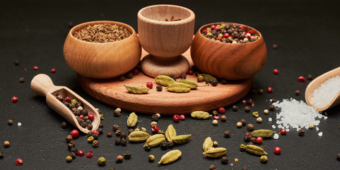 pepper and salt wood background