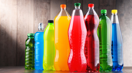 Plastic bottles of assorted carbonated soft drinks