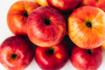 Fototapeta na wymiar Fresh ripe red apples on white background, vegetarian concept.