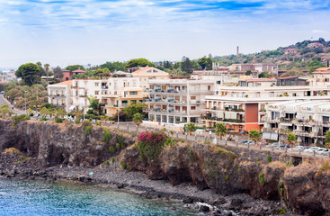 Obraz premium View of Acitrezza from the sea side of Acicastello, Catania, Sicily, Italy