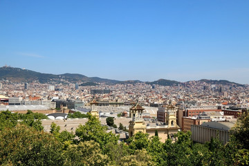 Fototapeta na wymiar Aerial view of Barcelona, Spain from Montjuïc hill on a sunny day. 