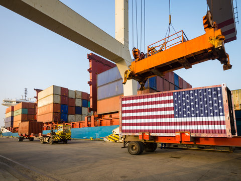 american container with usa flag in port. concept of american import and export.3D render