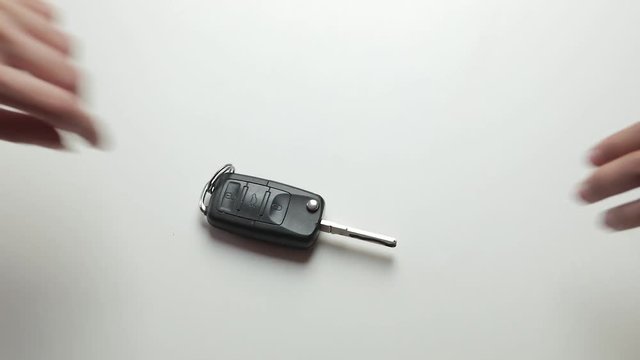 Girl giving her car keys to banker for a mortgage loan 4k