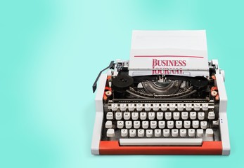 Old typewriter with paper  on background