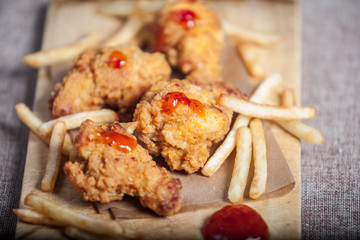 Fried chicken legs with french fries