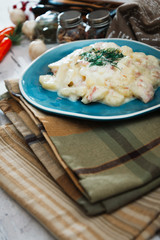 Gratin Of Potatoes, Ham, Eggs And Onions