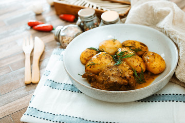 Piece of roasted pork and potatoes