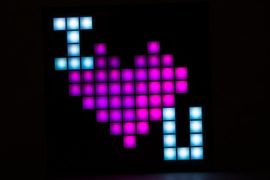 The inscription I love you in the form of pixels on a black background