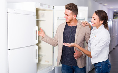 couple selecting  refrigerator