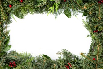 Frame of Christmas Tree Branches with Red Berries