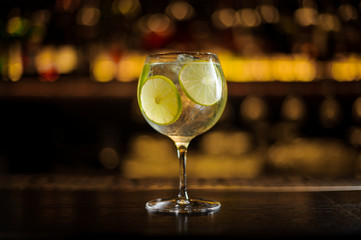 Elegant cocktail glass with fresh sour and sweet citrus cocktail